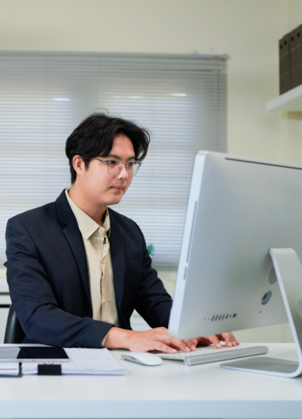 Man working on a computer in an office