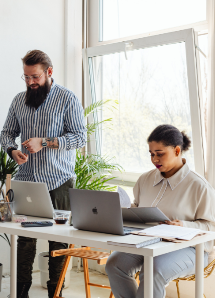 One man and one women working in the office