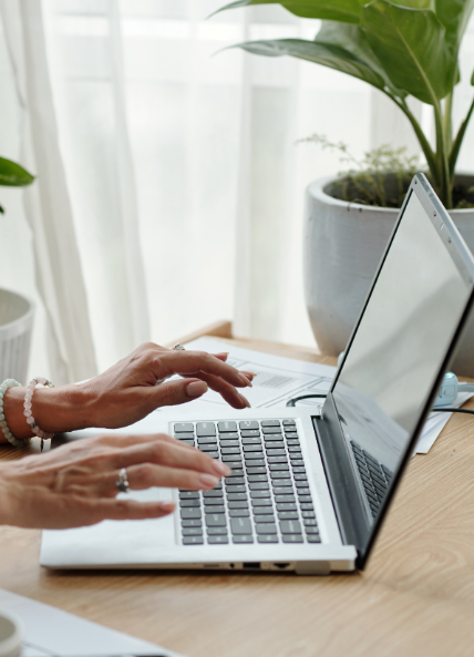 Lady working on laptop at a desk