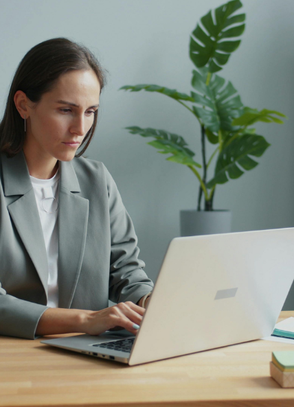 One women working on a laptop in the office 