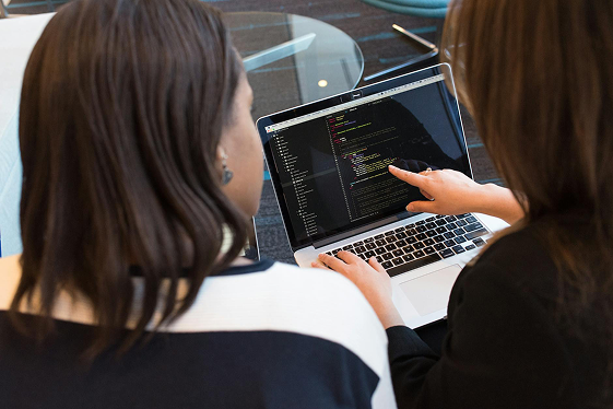 developer pointing to their code on screen