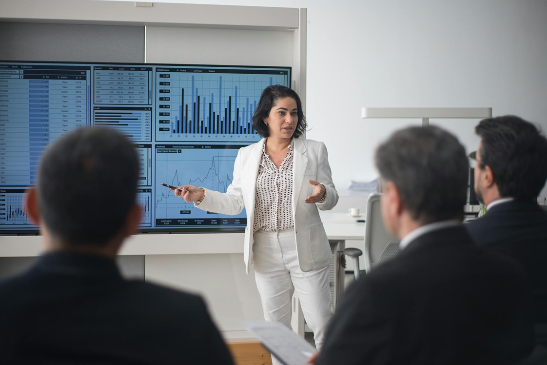 Person presenting metrics to staff