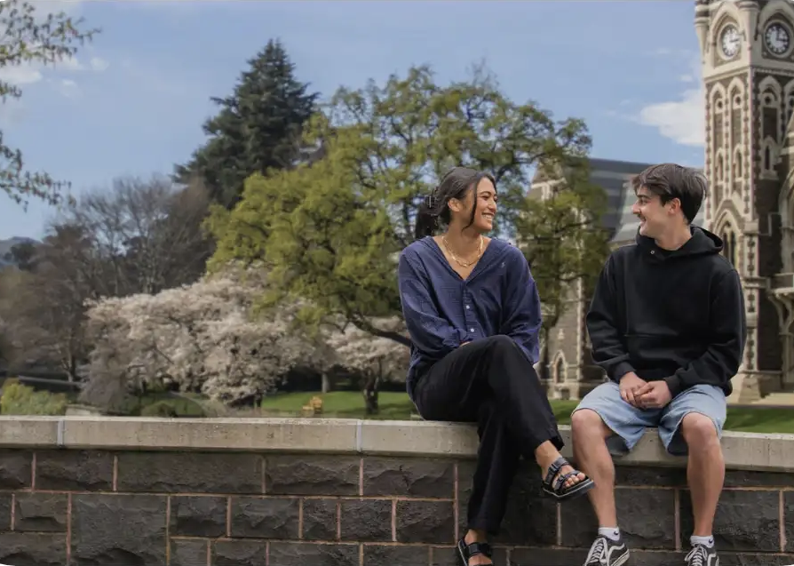 students talking on campus
